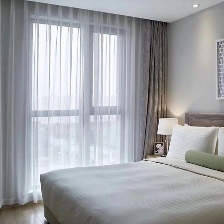 One Sunland Serviced Suites Managed By Lanson Place เซี่ยงไฮ้ ภายนอก รูปภาพ